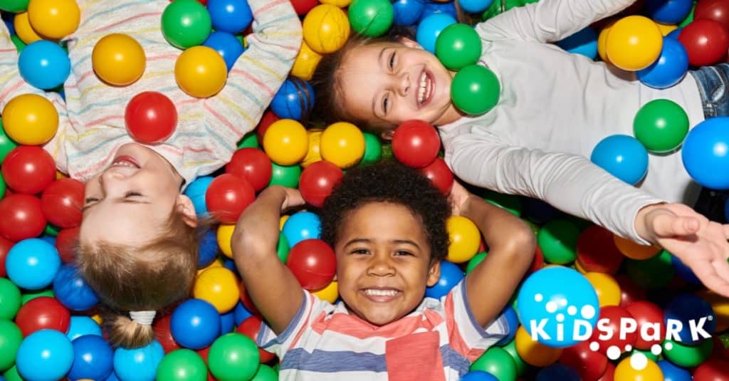 Kids enjoying the benefits of hourly childcare at KidsPark